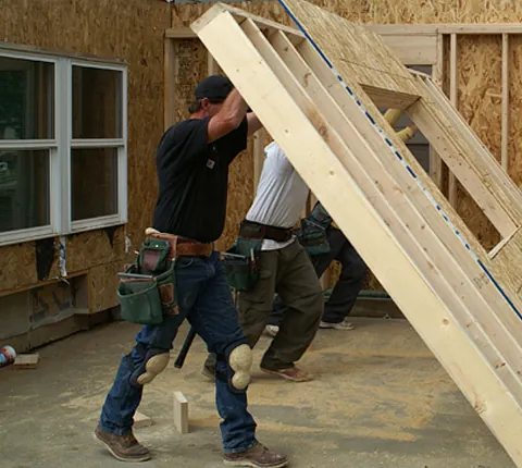 Men Putting Up a Wall